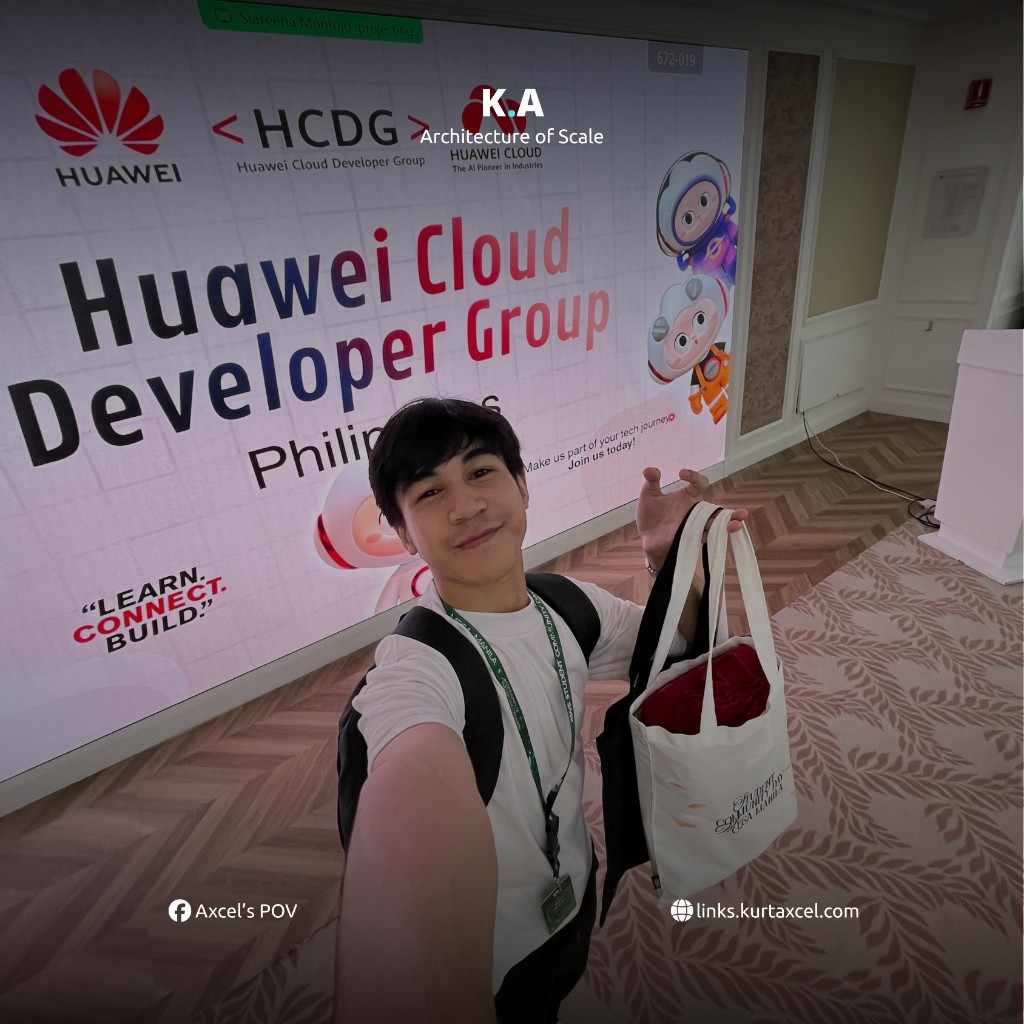 Kurt Axcel Peñano in front of the Huawei Cloud Developer Group Philippines screen, holding a tote bag
